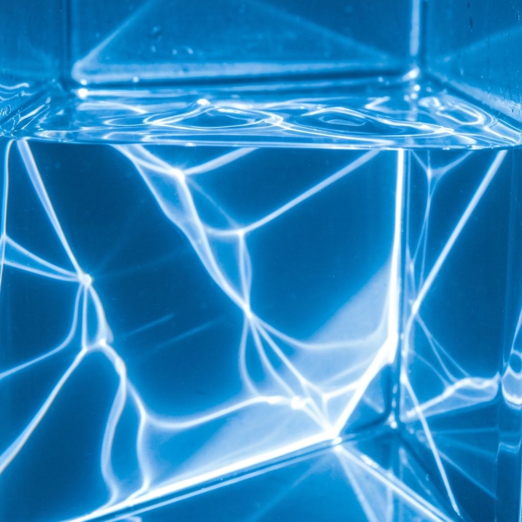 Blue light refracting through water